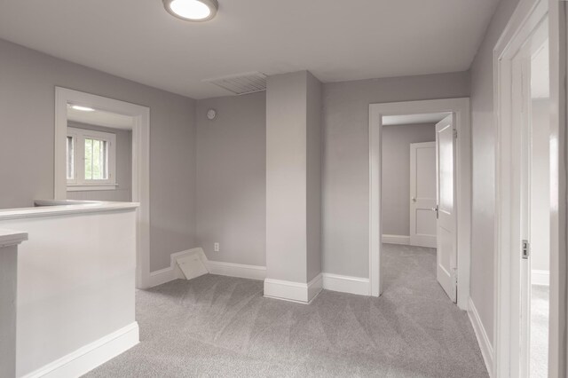 4020 Emerson Ave N, Minneapolis, MN 55412 - corridor featuring light colored carpet and baseboards