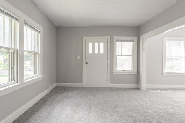 4020 Emerson Ave N, Minneapolis, MN 55412 - foyer with light colored carpet and baseboards