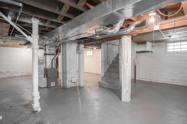 4020 Emerson Ave N, Minneapolis, MN 55412 - basement with stairs and heating unit
