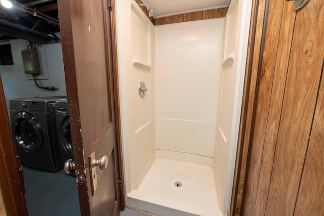 1702 Minnehaha Ave W, Saint Paul, MN 55104 - full bathroom featuring a stall shower and washing machine and dryer