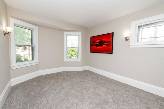 1702 Minnehaha Ave W, Saint Paul, MN 55104 - carpeted spare room with plenty of natural light