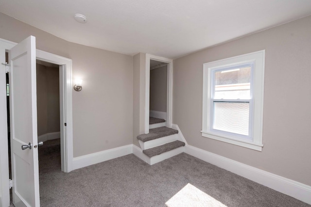 1702 Minnehaha Ave W, Saint Paul, MN 55104 - carpeted spare room with a smoke detector and baseboards