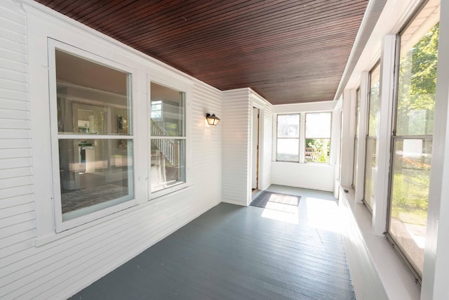 1702 Minnehaha Ave W, Saint Paul, MN 55104 - unfurnished sunroom with wooden ceiling and wood finished floors