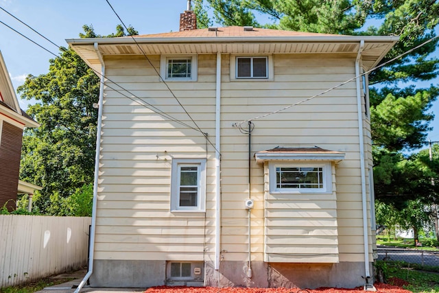 1702 Minnehaha Ave W, Saint Paul, MN 55104 - rear view of house with a chimney