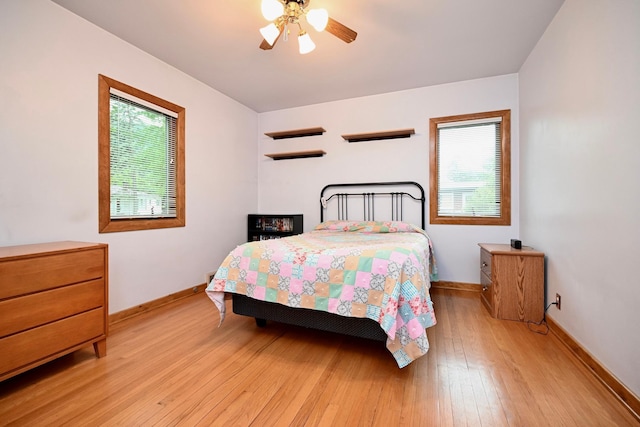 1314 Parkview Ave, Winona, MN 55987 - bedroom featuring light wood-style flooring and ceiling fan