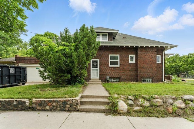 3148 Bryant Ave S, Minneapolis, MN 55408 - view of front of house featuring a front yard and brick siding