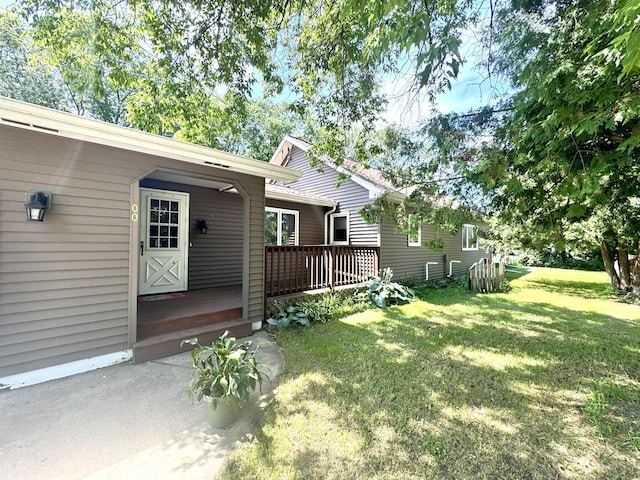 600 Gilbert Ave S, Park Rapids, MN 56470 - view of grassy yard with a wooden deck