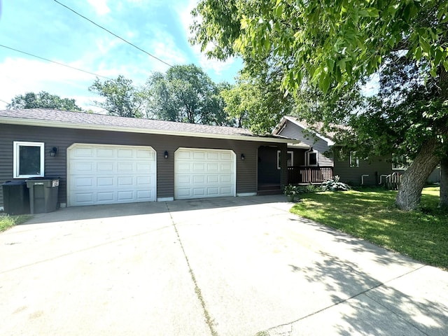 600 Gilbert Ave S, Park Rapids, MN 56470 - single story home featuring an attached garage, concrete driveway, and a front lawn