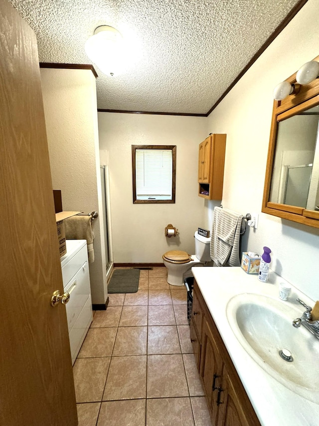 600 Gilbert Ave S, Park Rapids, MN 56470 - bathroom featuring a shower stall, vanity, crown molding, a textured ceiling, and tile patterned floors