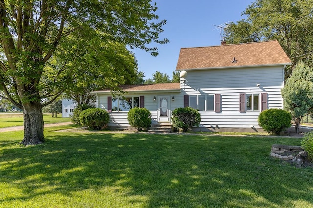 41072 280th St, Arlington Twp, MN 55307 - view of front of house featuring a front yard and a chimney
