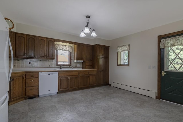 41072 280th St, Arlington Twp, MN 55307 - kitchen with white dishwasher, a baseboard heating unit, fridge, and plenty of natural light