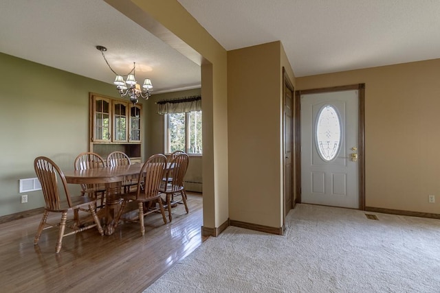 41072 280th St, Arlington Twp, MN 55307 - entrance foyer with a chandelier and light carpet