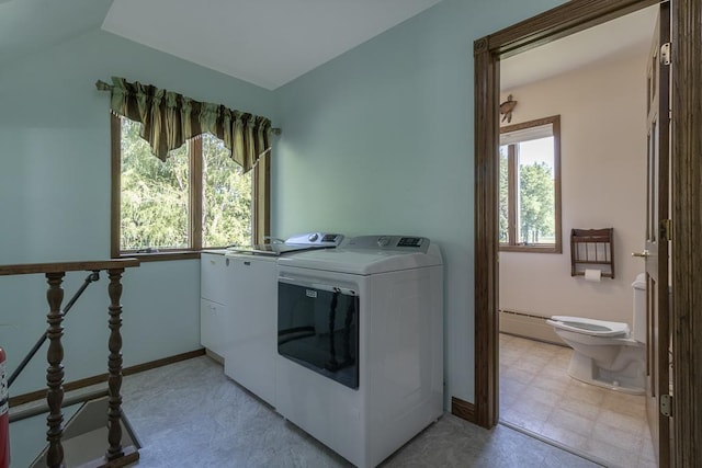 41072 280th St, Arlington Twp, MN 55307 - laundry area featuring washing machine and dryer and a baseboard heating unit