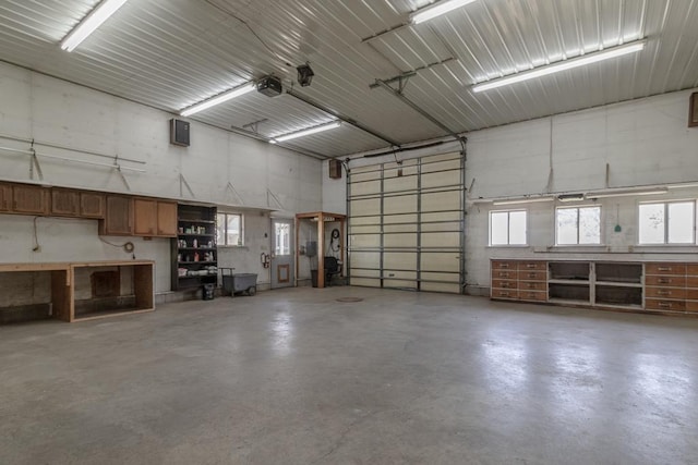 41072 280th St, Arlington Twp, MN 55307 - garage featuring a garage door opener