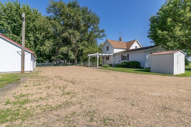 41072 280th St, Arlington Twp, MN 55307 - view of yard with a pergola and a storage shed
