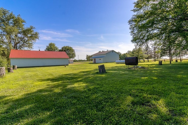 41072 280th St, Arlington Twp, MN 55307 - view of grassy yard with a pole building and an outbuilding