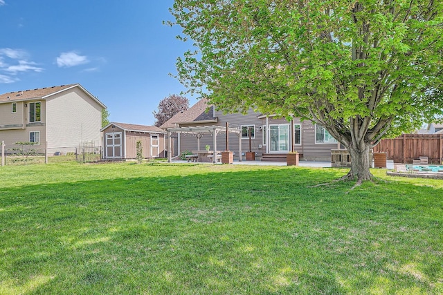 2907 Asarum Ct, Shakopee, MN 55379 - fenced backyard with a patio area, a shed, a pergola, and entry steps