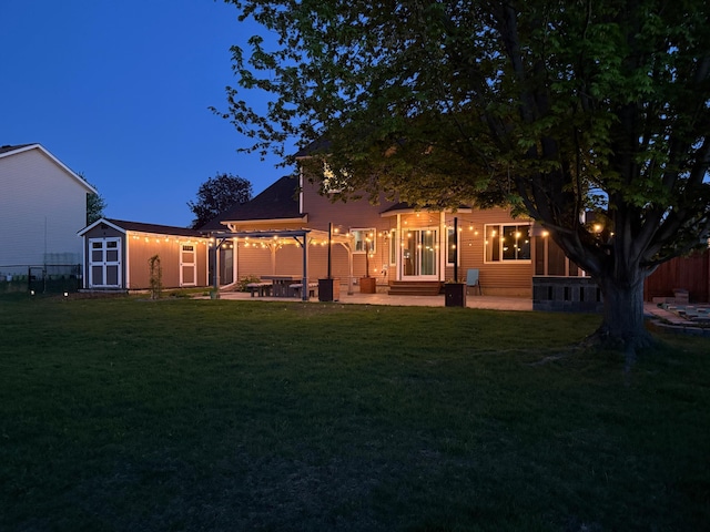 2907 Asarum Ct, Shakopee, MN 55379 - rear view of property featuring a patio and a storage shed