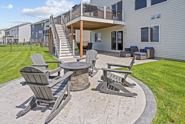 5027 Jansen Ave NE, Saint Michael, MN 55376 - view of patio / terrace with stairs, a residential view, and an outdoor living space with a fire pit