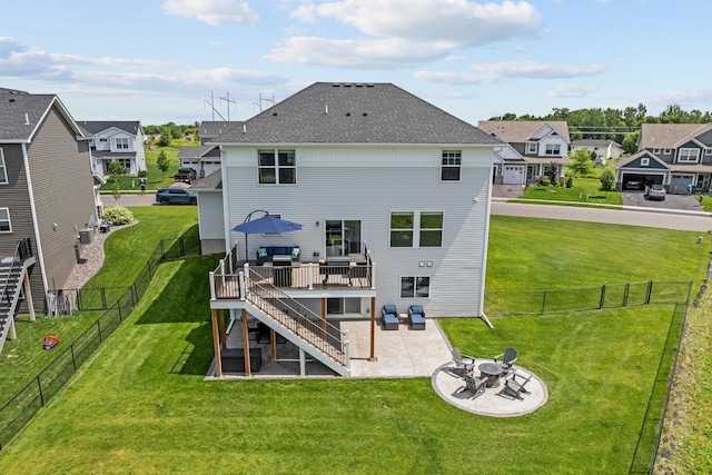 5027 Jansen Ave NE, Saint Michael, MN 55376 - rear view of house featuring a residential view, a patio area, a deck, a fenced backyard, and stairway
