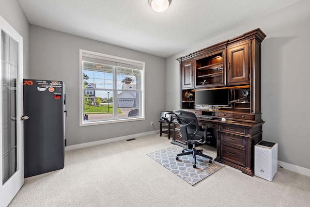 5027 Jansen Ave NE, Saint Michael, MN 55376 - office area featuring light colored carpet and baseboards