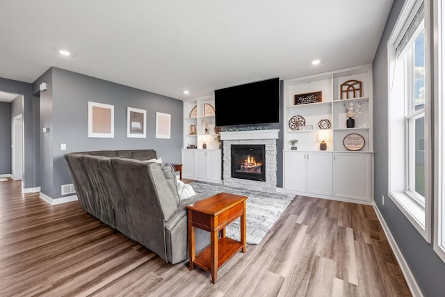 5027 Jansen Ave NE, Saint Michael, MN 55376 - living area featuring wood finished floors, plenty of natural light, and recessed lighting