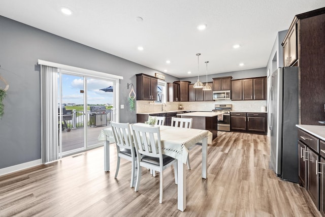 5027 Jansen Ave NE, Saint Michael, MN 55376 - dining space featuring light wood-style floors and recessed lighting