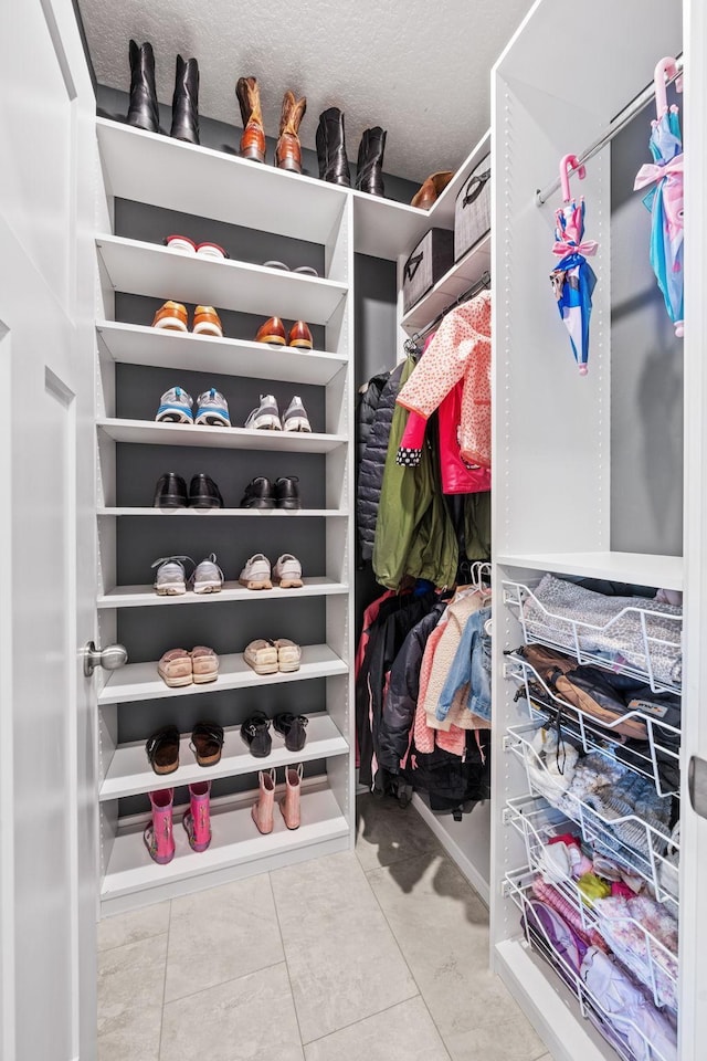 5027 Jansen Ave NE, Saint Michael, MN 55376 - walk in closet with tile patterned floors