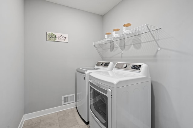 5027 Jansen Ave NE, Saint Michael, MN 55376 - washroom with washing machine and dryer and baseboards