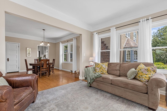 500 Otis Ave, Saint Paul, MN 55104 - living area featuring wood finished floors and ornamental molding