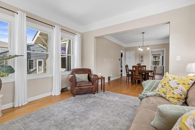 500 Otis Ave, Saint Paul, MN 55104 - living area featuring wood finished floors and ornamental molding