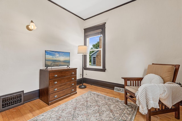 500 Otis Ave, Saint Paul, MN 55104 - living area featuring light wood-style flooring and ornamental molding