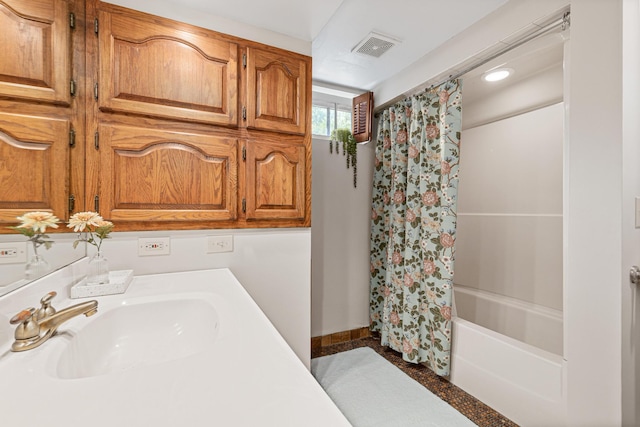 500 Otis Ave, Saint Paul, MN 55104 - bathroom featuring a sink and shower / bath combo