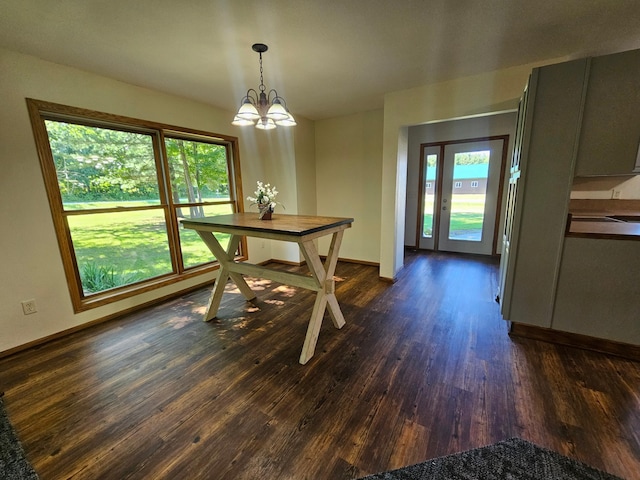 21578 Edwards Dr, Irondale Twp, MN 56455 - dining room with dark wood-style floors and a chandelier