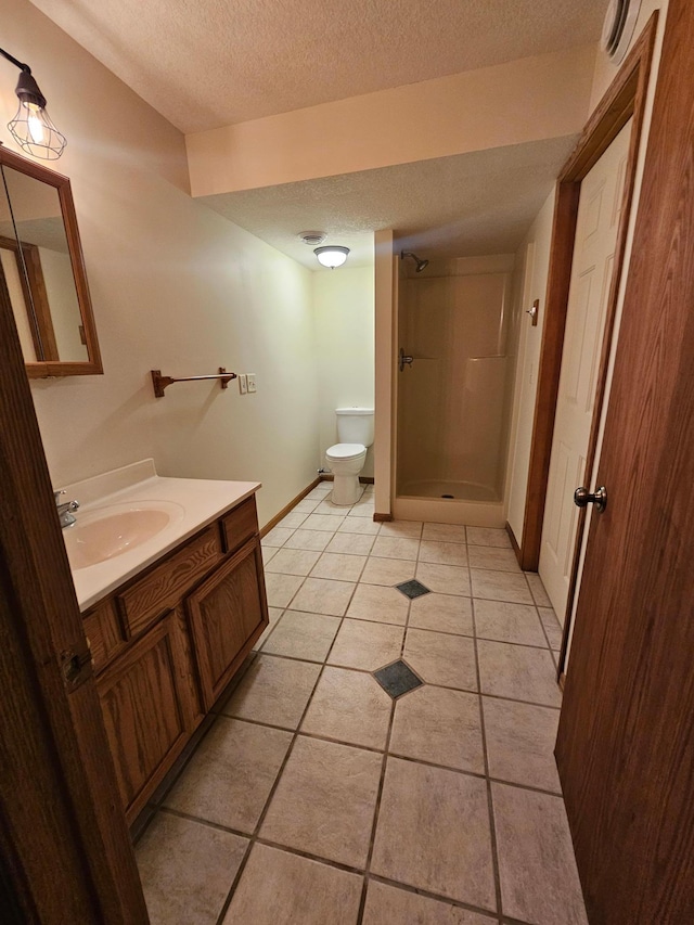 21578 Edwards Dr, Irondale Twp, MN 56455 - full bath with a textured ceiling, a shower stall, vanity, and tile patterned floors