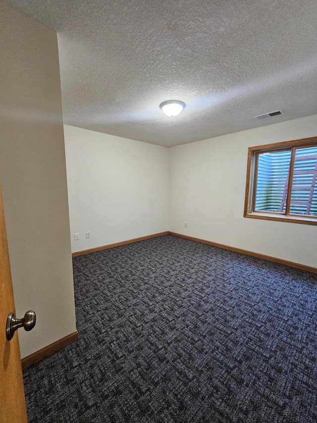 21578 Edwards Dr, Irondale Twp, MN 56455 - spare room featuring carpet flooring and a textured ceiling