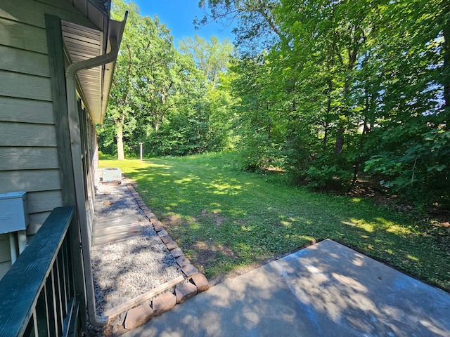 21578 Edwards Dr, Irondale Twp, MN 56455 - view of green lawn featuring a patio