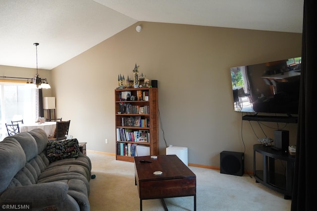 11223 Diane Ave, Becker, MN 55308 - living area with lofted ceiling, light carpet, a chandelier, and healthy amount of natural light