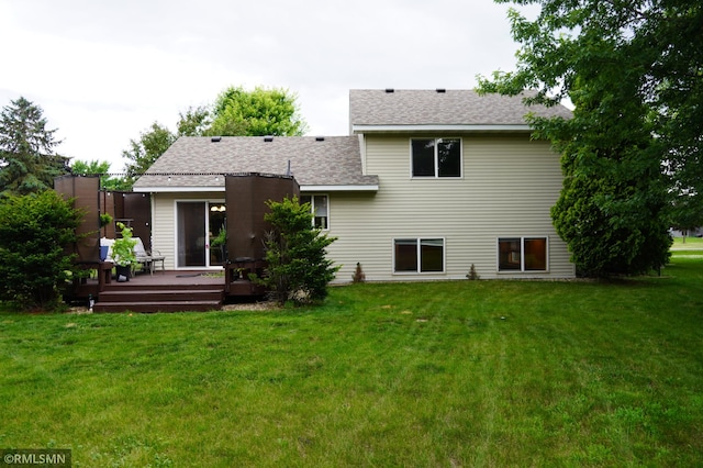 11223 Diane Ave, Becker, MN 55308 - back of property with roof with shingles, a wooden deck, and a yard