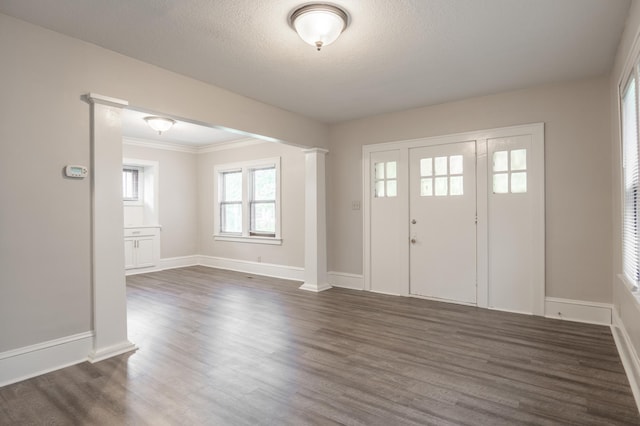 3919 Dupont Ave N, Minneapolis, MN 55412 - foyer entrance with dark wood finished floors and crown molding