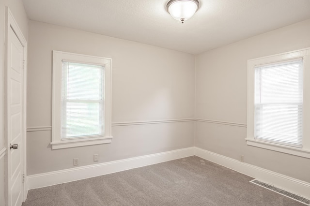 3919 Dupont Ave N, Minneapolis, MN 55412 - unfurnished room with carpet floors and baseboards