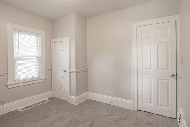 3919 Dupont Ave N, Minneapolis, MN 55412 - carpeted spare room with baseboards