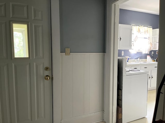 1157 6th Ave S, Windom, MN 56101 - washroom with wainscoting and a sink