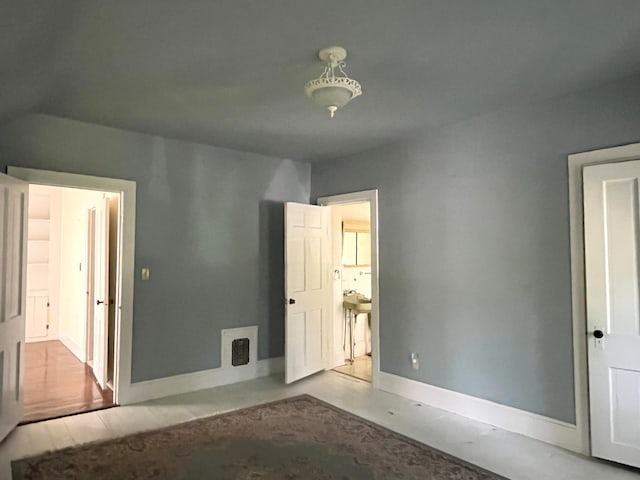 1157 6th Ave S, Windom, MN 56101 - unfurnished bedroom featuring baseboards