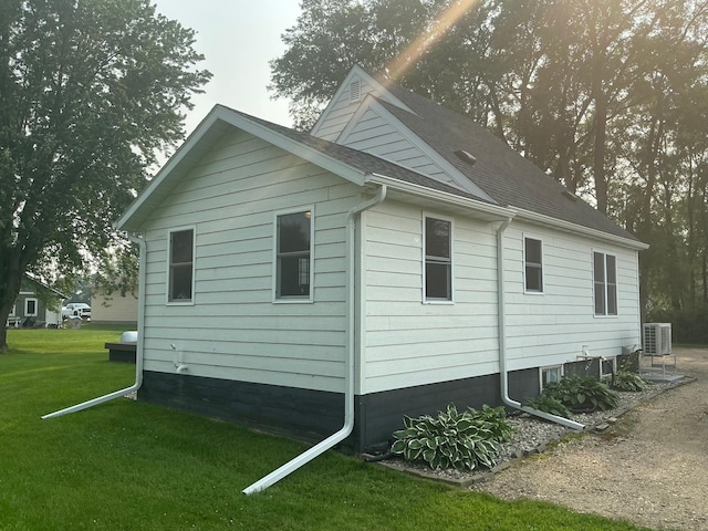 705 State Highway 28 W, Glenwood, MN 56334 - view of side of property with a central AC unit and a lawn