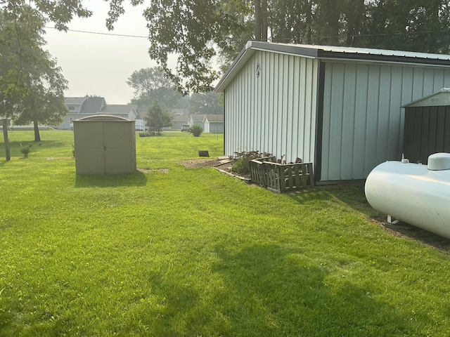 705 State Highway 28 W, Glenwood, MN 56334 - view of grassy yard featuring a storage shed