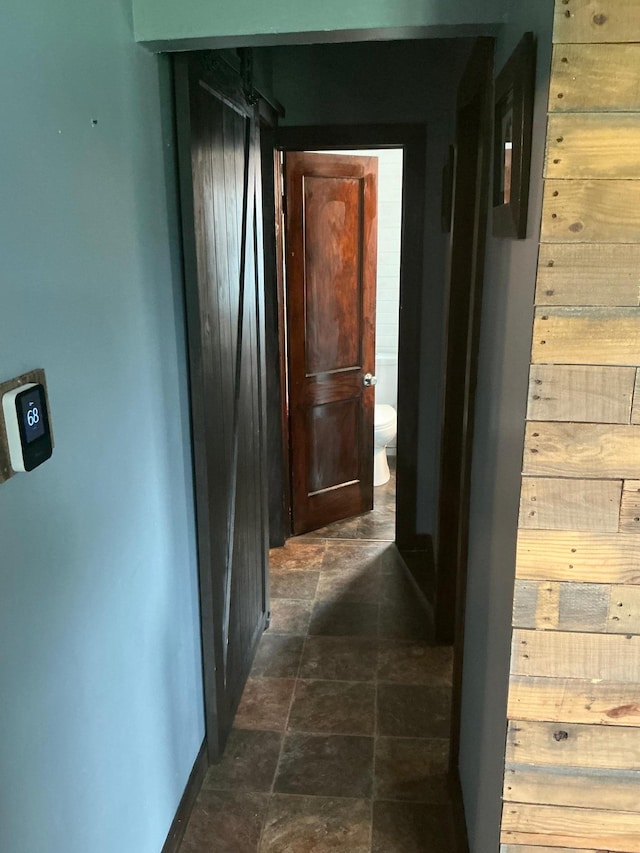 705 State Highway 28 W, Glenwood, MN 56334 - corridor with dark stone finish floors