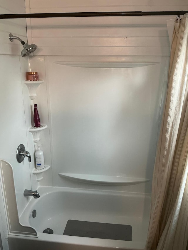 705 State Highway 28 W, Glenwood, MN 56334 - bathroom featuring shower / tub combo with curtain