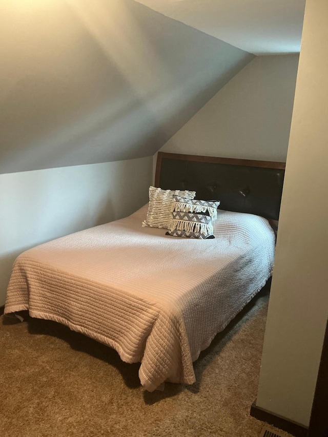 705 State Highway 28 W, Glenwood, MN 56334 - carpeted bedroom featuring vaulted ceiling
