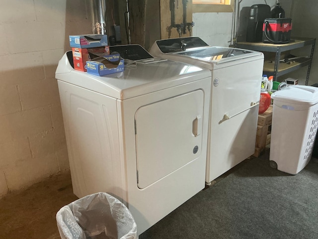 705 State Highway 28 W, Glenwood, MN 56334 - laundry area featuring washing machine and dryer, concrete block wall, and carpet